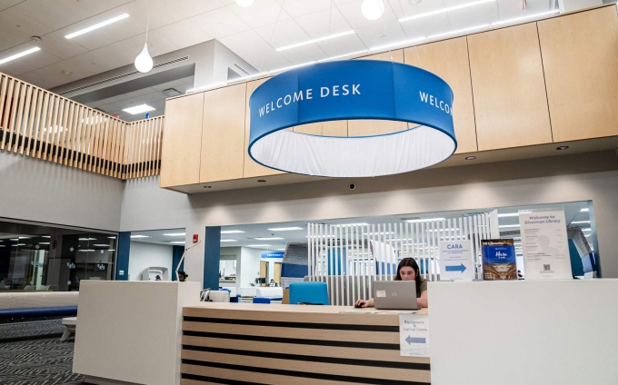 The Welcome Desk on the second floor of Silverman Library. 