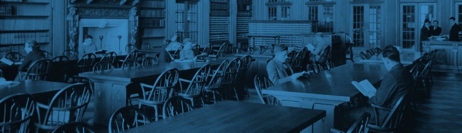 Students reading in the Austin Flint Reading Room on the South Campus. 