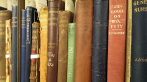 Photo of nursing books in the stacks in the History of Medicine Collection. 