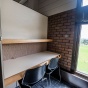 Picture of Lockwood Library 3rd floor open study carrels. 