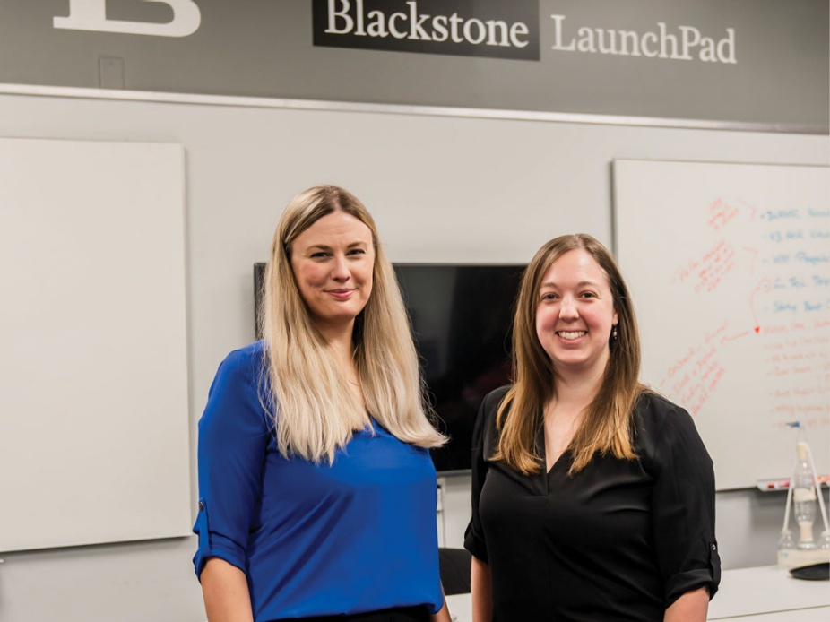 UB librarians pose for a photo in the LaunchPad. 
