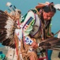 Native American man in traditional dress. 