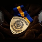Graphic with headshots of Deborah Chiarella and Ophelia Morey with the SUNY Chancellor’s Award for Excellence medal. 