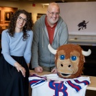 University Archives' Hope Dunbar and Bill Offhaus with the Wooly Bully Mascot. 
