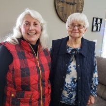 Susan and her mother in their Christmas finery in December 2024. 