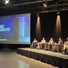 Laura Taddeo sits with other panelists at the event. 