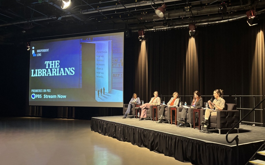 Laura Taddeo sits with other panelists at the event. 