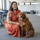 Kae Savar and their therapy dog, Samwise. 